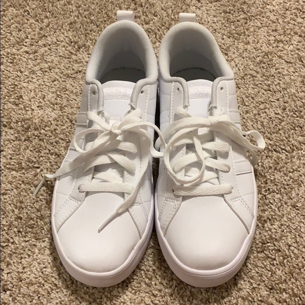 brand new Adidas Superstars, all white